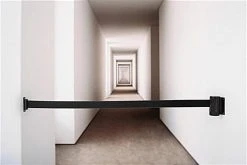 QueuePole.Economy Wall Mounted Retractable 7' Stanchion Belt - Black -Displays2go Shop wmstc25bk1.renv preview